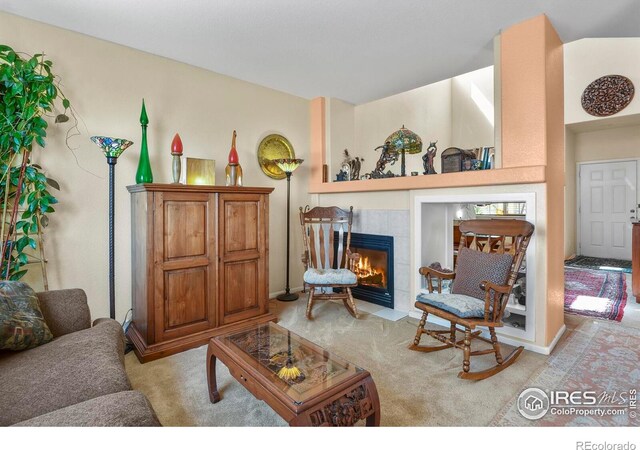 11470 Ebony St, Firestone, CO 80504 - living area featuring light carpet and a tiled fireplace