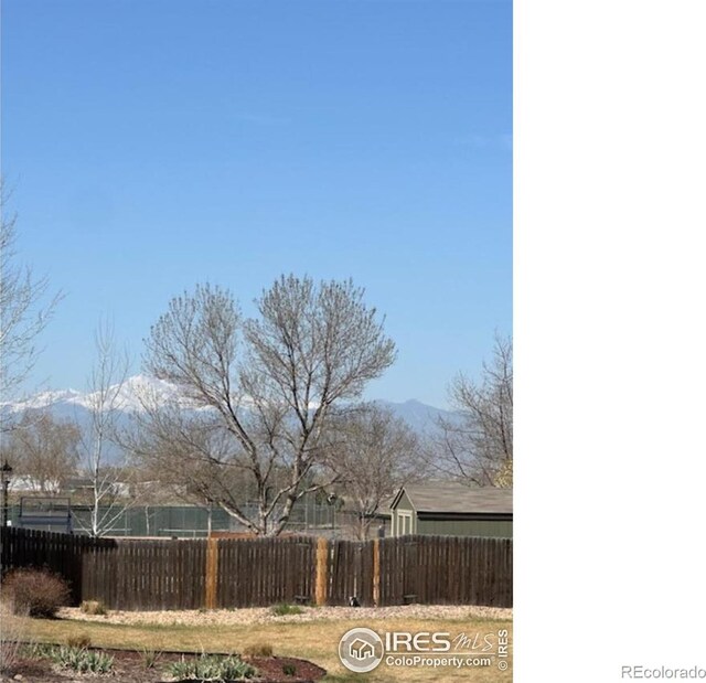 11470 Ebony St, Firestone, CO 80504 - view of yard featuring a mountain view and fence