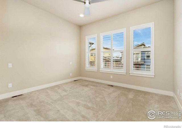 1658 Freewheel Dr, Fort Collins, CO 80525 - carpeted empty room with baseboards, a ceiling fan, and visible vents