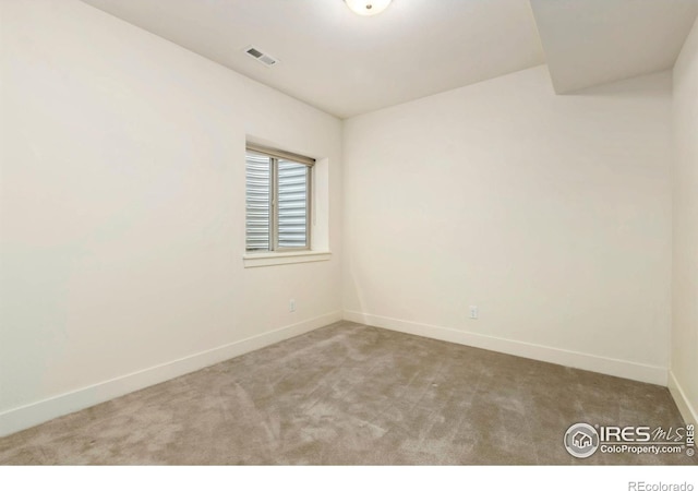 1658 Freewheel Dr, Fort Collins, CO 80525 - spare room with visible vents, baseboards, and carpet floors