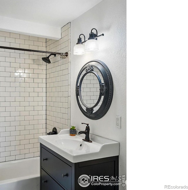 285 Holbrook St, Erie, CO 80516 - bathroom featuring vanity and shower / tub combination