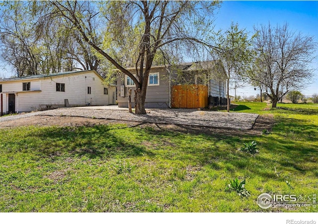 285 Holbrook St, Erie, CO 80516 - back of house with a yard and a patio area