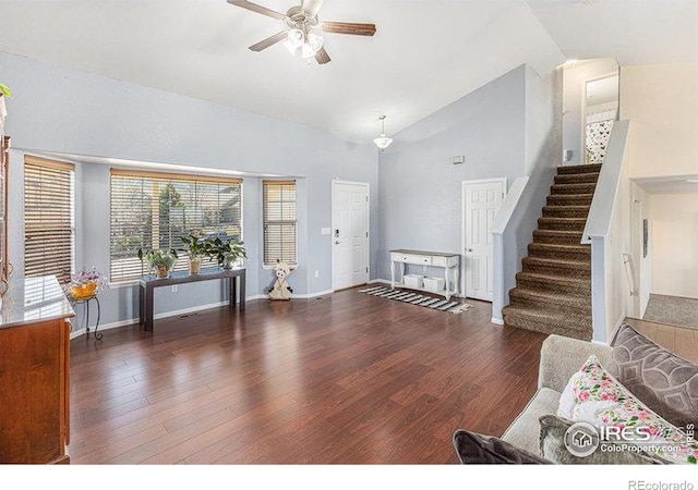 8715 18th Street Rd, Greeley, CO 80634 - living room with stairs, baseboards, wood finished floors, and ceiling fan