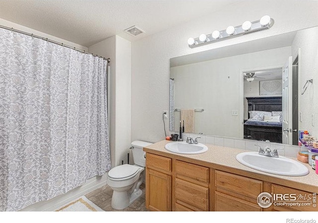 8715 18th Street Rd, Greeley, CO 80634 - ensuite bathroom featuring double vanity, a sink, ensuite bathroom, and visible vents
