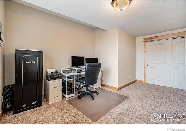 office area with carpet flooring and baseboards