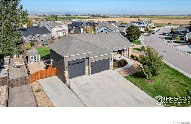 birds eye view of property featuring a residential view