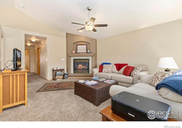 5151 Boardwalk Dr Unit K4, Fort Collins, CO 80525 - carpeted living area featuring ceiling fan, a tile fireplace, and lofted ceiling