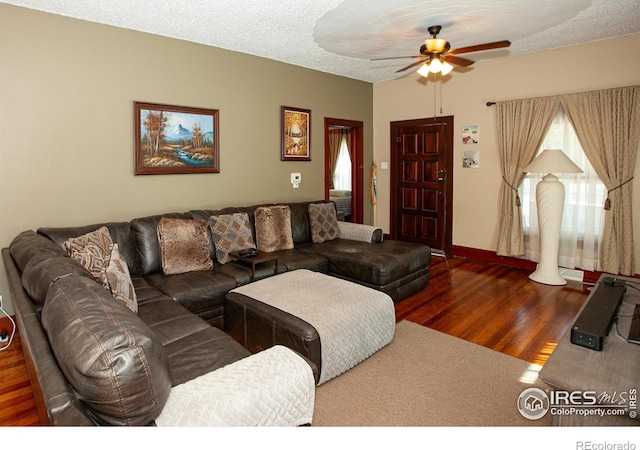 230 Beattie St, Sterling, CO 80751 - living room with ceiling fan and wood finished floors