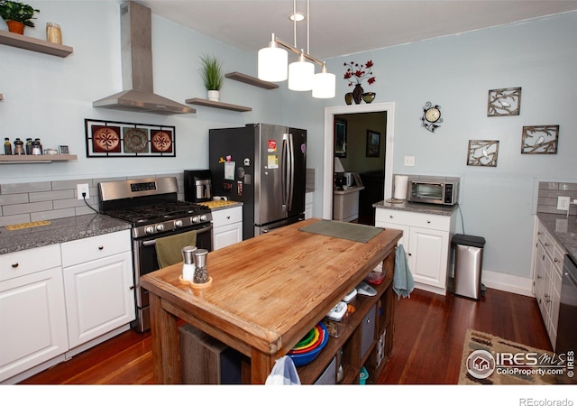 230 Beattie St, Sterling, CO 80751 - kitchen with stainless steel appliances, white cabinetry, wall chimney exhaust hood, and open shelves