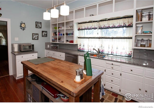 230 Beattie St, Sterling, CO 80751 - kitchen with white cabinets, open shelves, dishwasher, a sink, and wooden counters