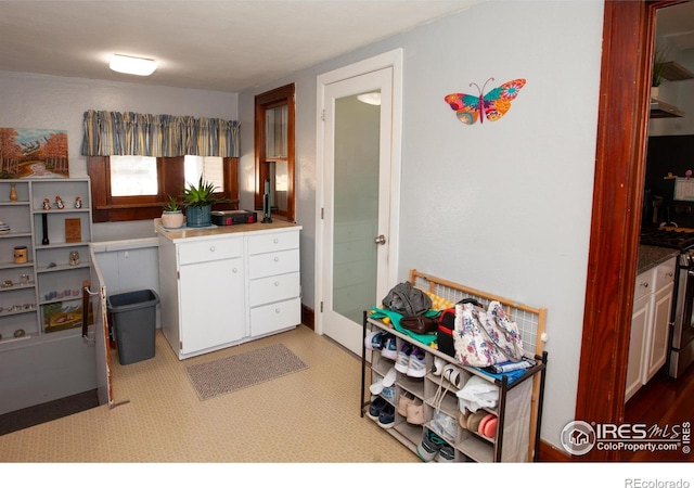 230 Beattie St, Sterling, CO 80751 - kitchen with stainless steel range with gas stovetop and white cabinets
