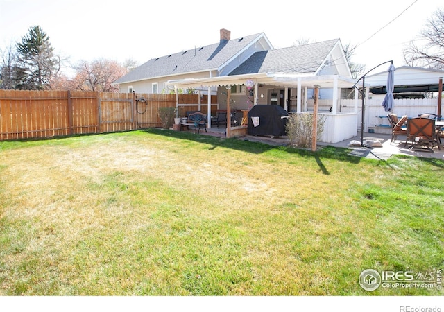 230 Beattie St, Sterling, CO 80751 - view of yard with a patio area and a fenced backyard