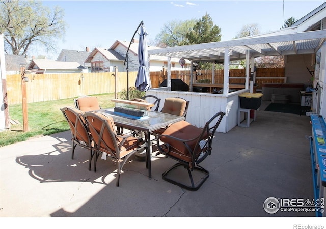 230 Beattie St, Sterling, CO 80751 - view of patio featuring fence and outdoor dining area