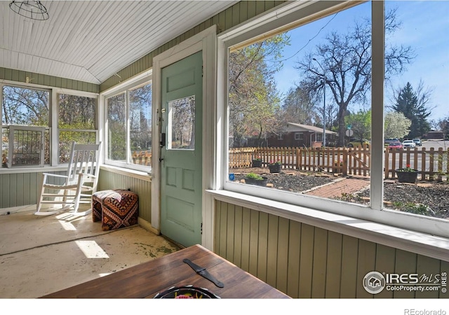 sunroom featuring radiator heating unit
