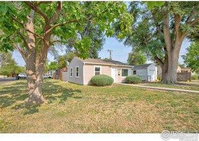 618 19th Ave, Greeley, CO 80631 - single story home featuring stucco siding and a front yard