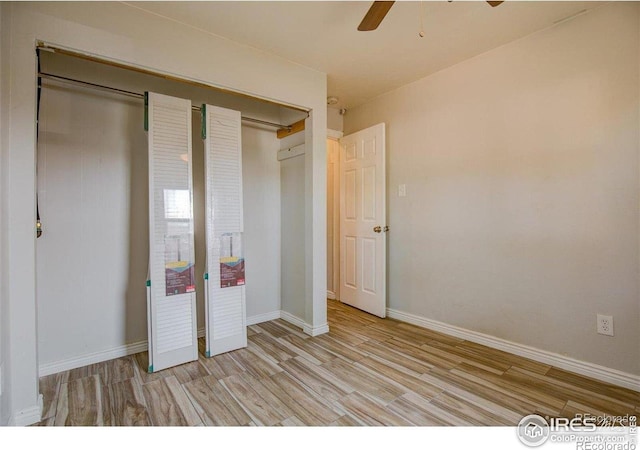 618 19th Ave, Greeley, CO 80631 - unfurnished bedroom featuring baseboards, a ceiling fan, and wood finished floors