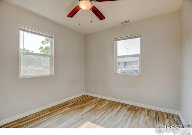 618 19th Ave, Greeley, CO 80631 - unfurnished room with a ceiling fan, baseboards, visible vents, and light wood-type flooring