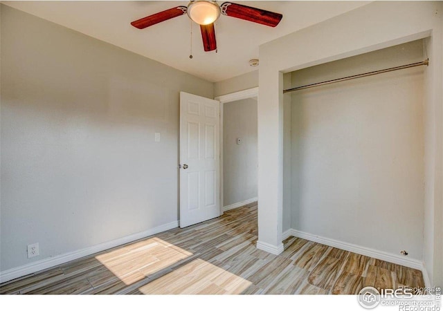 618 19th Ave, Greeley, CO 80631 - unfurnished bedroom featuring light wood-type flooring, baseboards, ceiling fan, and a closet