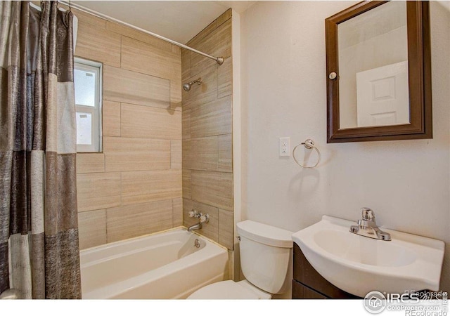 618 19th Ave, Greeley, CO 80631 - bathroom featuring shower / bath combo with shower curtain, toilet, and vanity