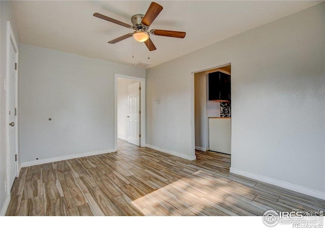 618 19th Ave, Greeley, CO 80631 - unfurnished room with a ceiling fan, baseboards, and wood finished floors