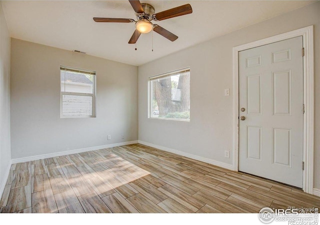 618 19th Ave, Greeley, CO 80631 - empty room featuring baseboards, visible vents, a wealth of natural light, and light wood finished floors