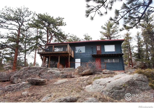view of front of property featuring a deck