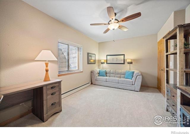 432 Valley View Rd, Loveland, CO 80537 - living area featuring baseboard heating, light carpet, and a ceiling fan