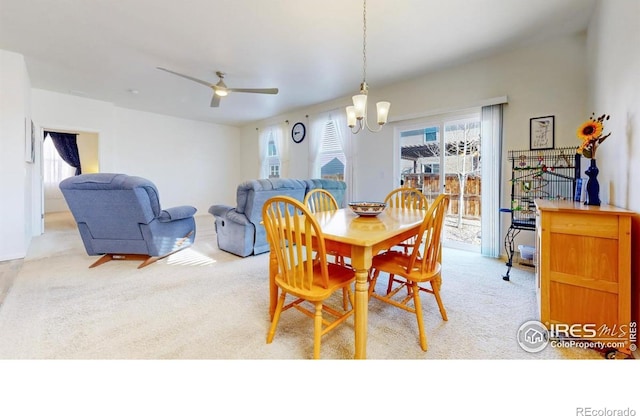 3712 Daylily St, Wellington, CO 80549 - dining space with ceiling fan with notable chandelier and carpet floors