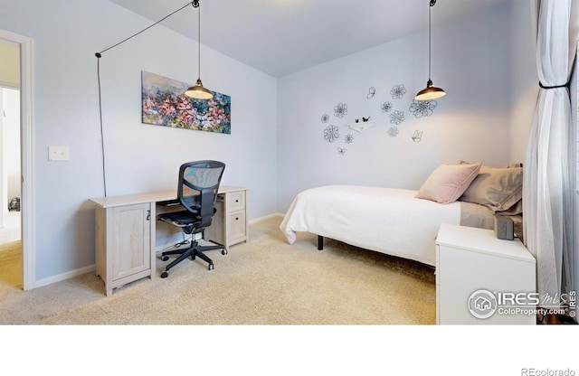 3712 Daylily St, Wellington, CO 80549 - bedroom featuring baseboards and light colored carpet