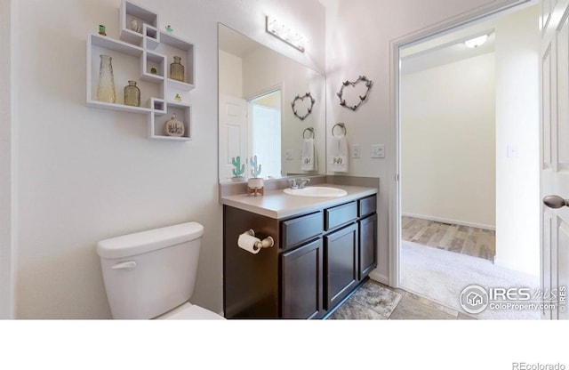 3712 Daylily St, Wellington, CO 80549 - bathroom with toilet and vanity
