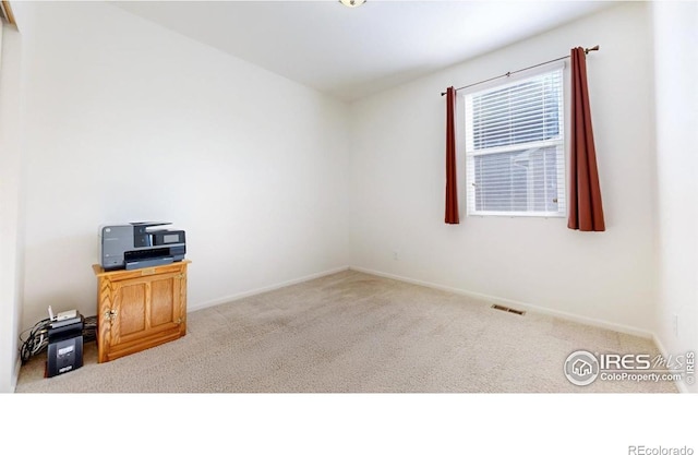 3712 Daylily St, Wellington, CO 80549 - empty room featuring visible vents, baseboards, and carpet
