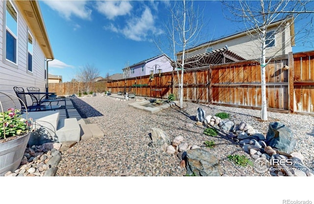 3712 Daylily St, Wellington, CO 80549 - view of yard with a fenced backyard and a patio