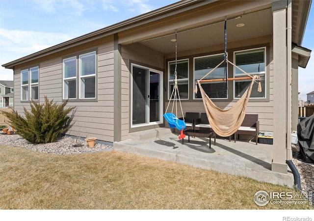 rear view of house with a patio area