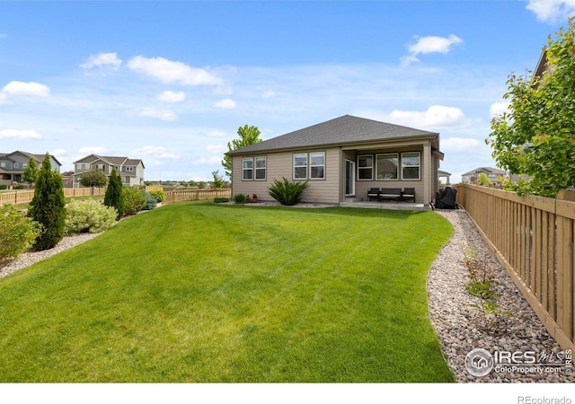 5219 Odessa Lake St, Timnath, CO 80547 - rear view of house featuring a patio