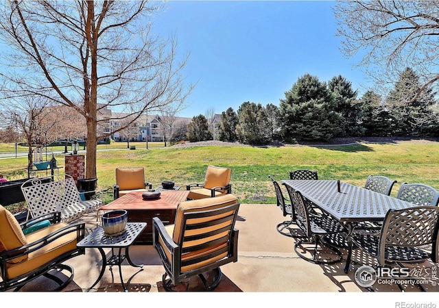 view of patio featuring outdoor dining space