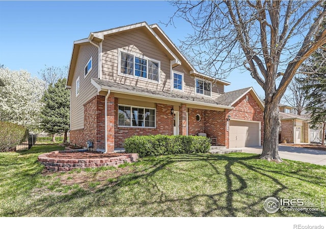 traditional-style house featuring a front yard, an attached garage, fence, brick siding, and driveway