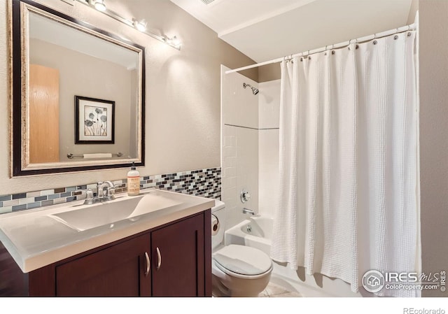 bathroom with shower / bath combo, toilet, tasteful backsplash, and vanity