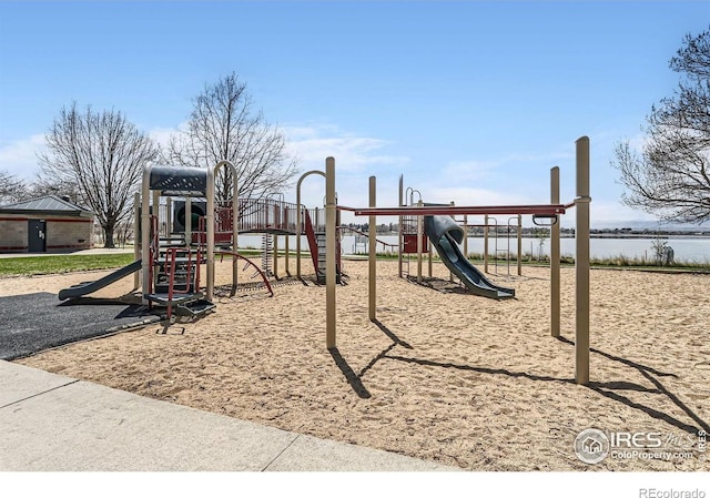 community playground featuring a water view