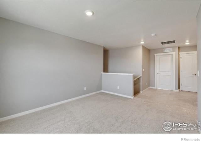 1898 Westport Ave, Berthoud, CO 80513 - unfurnished room featuring light carpet, recessed lighting, visible vents, and baseboards