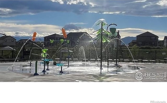 1898 Westport Ave, Berthoud, CO 80513 - exterior space with a residential view, fence, and playground community