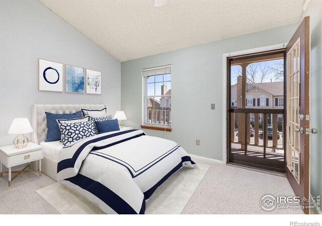 104 Pheasant Run, Louisville, CO 80027 - bedroom featuring access to outside, carpet flooring, a textured ceiling, baseboards, and lofted ceiling