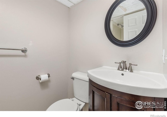 104 Pheasant Run, Louisville, CO 80027 - bathroom featuring toilet and vanity