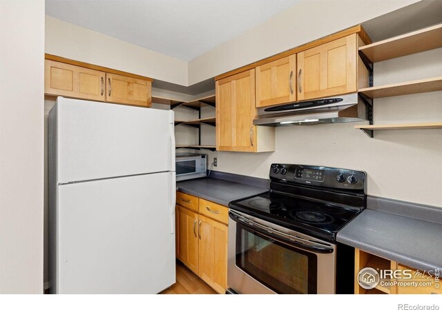 104 Pheasant Run, Louisville, CO 80027 - kitchen with white appliances, open shelves, under cabinet range hood, dark countertops, and light wood-style floors