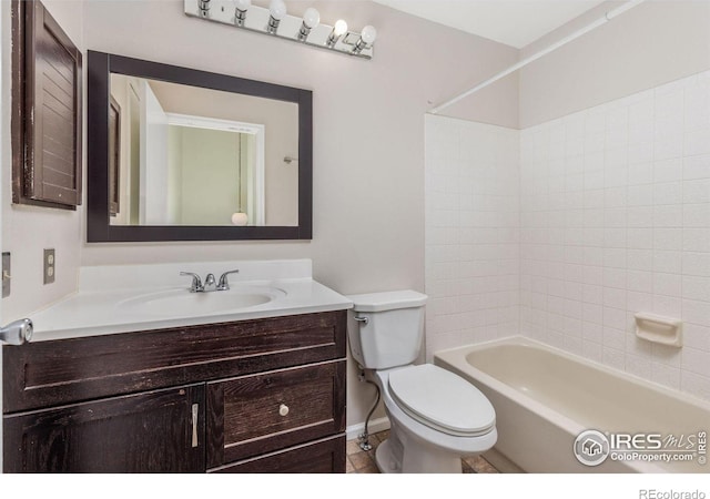 104 Pheasant Run, Louisville, CO 80027 - bathroom featuring toilet, vanity, and tub / shower combination