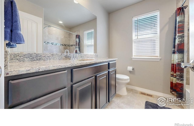 bathroom featuring toilet, baseboards, visible vents, a shower with shower curtain, and vanity