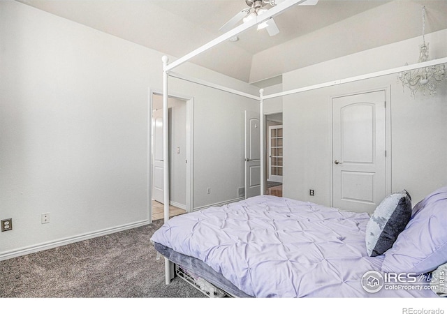 carpeted bedroom featuring baseboards and ceiling fan
