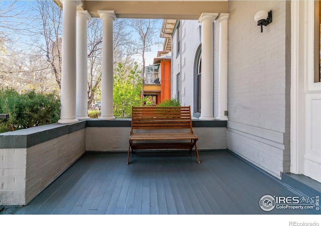 balcony featuring a porch