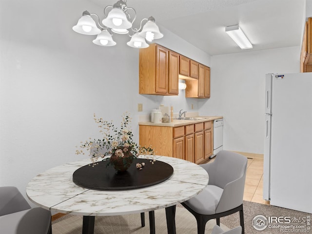 1155 S Saint Vrain Ave Unit 1-3, Estes Park, CO 80517 - dining area with an inviting chandelier and light tile patterned flooring