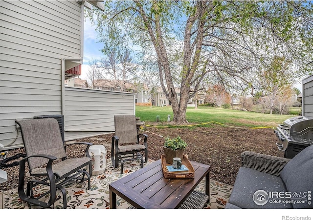 view of patio / terrace featuring a grill
