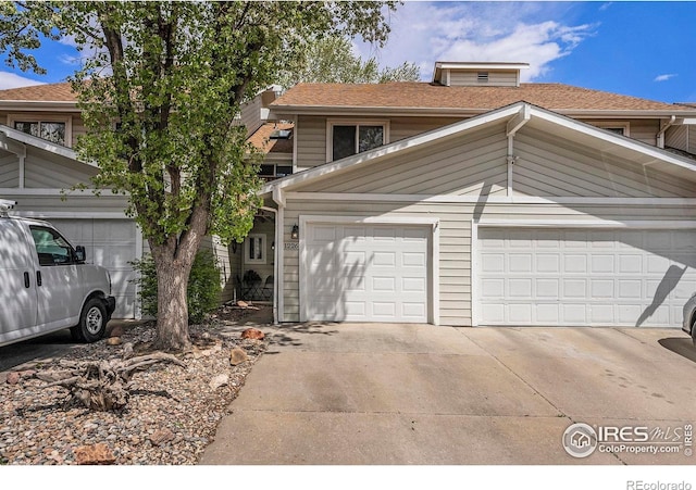 view of front of house with a garage and driveway